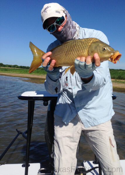 fly fishing for carp off East Cape Skiff