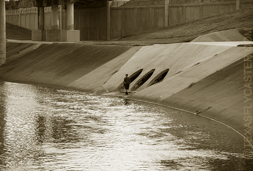 Brays Bayou along the concrete creek banks