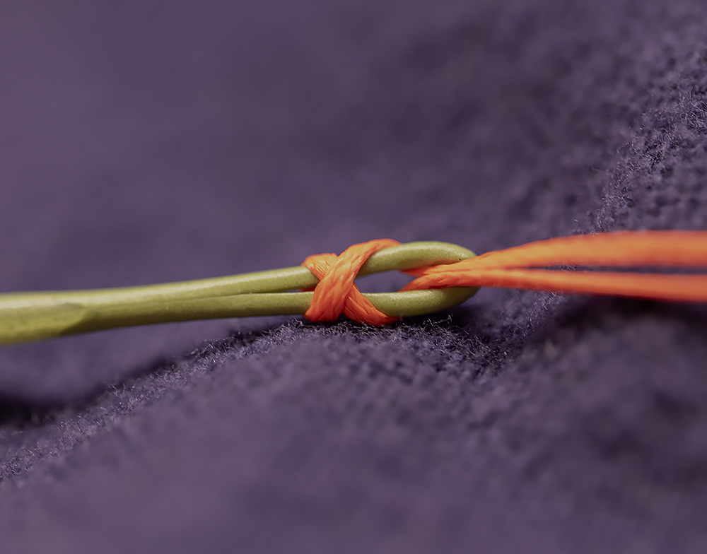 Double loop backing to line